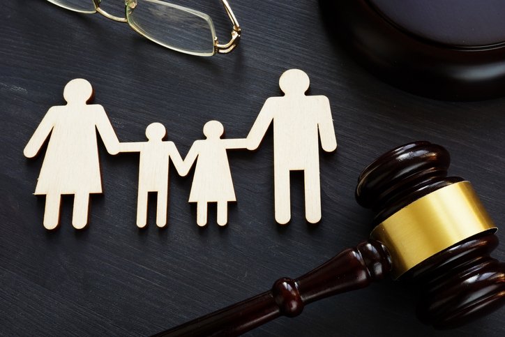 Family law concept. Figures and gavel. Divorce